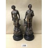TWO CONTINENTAL SPELTER FIGURES OF A MALE AND FEMALE, BOTH MOUNTED UPON WOODEN BASES, LARGEST 27.5CM