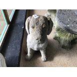 A CONCRETE SEATED DOG 52 CM