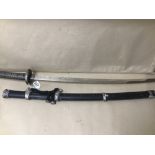 A VINTAGE KATANA SWORD WITH DECORATIVE METAL HANDLE.