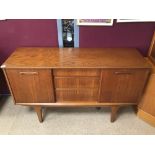 A MID CENTURY SMALL TEAK SIDEBOARD 127 X 44CM X 73