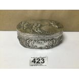 A HIGHLY DECORATED EMBOSSED SILVER BOX OF OVAL FORM, MARKED TO BASE, 200G