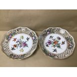 A PAIR OF LATE 19TH CENTURY DRESDEN PORCELAIN WALL PLATES, HAND PAINTED SCENES OF BIRDS AMONGST