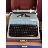 A CASED OLIVETTI STUDIO 44 TYPEWRITER