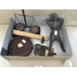 A BOX OF MIXED COLLECTABLES INCLUDING A CAST FIGURE, VINTAGE SCALES AND TAPE MEASURE