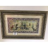 A VINTAGE FRAMED AND GLAZED PAINTING ON PORCELAIN OF A MIDDLE EASTERN SCENE 44 X 29CMS