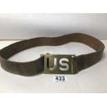 A US ARMY 7TH CAVALRY BRASS BELT BUCKLE ON ORIGINAL LEATHER BELT, MARKED TO REVERSE PRICE & CO