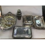 A QUANTITY OF SILVER PLATE ITEMS INCLUDING A COCKTAIL SHAKER