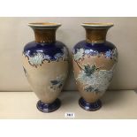 A PAIR OF ROYAL DOULTON GLAZED STONEWARE BALUSTER VASES WITH TUBE LINED FLORAL DECORATION, 35CM HIGH