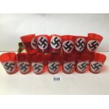 A COLLECTION OF ORIGINAL 1930'S/40'S THIRD REICH CANDLE HOLDERS, RED CELLULOID, 8CM HIGH