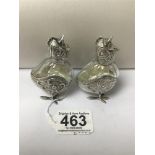 A PAIR OF SILVER PLATED/GLASS SALT AND PEPPER CONDIMENT SET IN THE FORM OF BIRDS