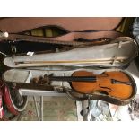 A VINTAGE VIOLIN IN LEATHER HARDCASE WITH A NICE BOW