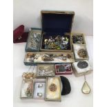 A MIXED BOX OF COSTUME JEWELLERY