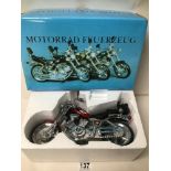 A NOVELTY GERMAN BMW MOTORCYLE TABLE LIGHTER, IN ORIGINAL BOX