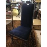 A BLUE VELVET VICTORIAN BEDROOM CHAIR ON CASTORS