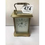 A BRASS CARRIAGE CLOCK BY LONDON CLOCK CO 12 CM W/O WITH KEY