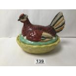 A DETAILED CERAMIC CHICKEN SHAPED EGG HOLDER, UNKNOWN MAKER, 15.5CM HIGH