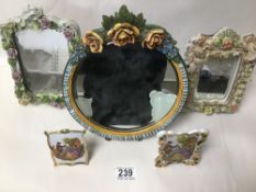 THREE MIRRORS INCLUDING A MIESSEN BEVELLED MIRROR WITH CHERUBS, ALSO TWO FRENCH PORCELAIN SMALL