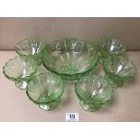 GROUP OF GREEN MOULDED GLASS, INCLUDING A SERVING BOWL AND SIX SUNDAE DISHES