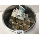 A TIN OF USED COINAGE AND NOTES