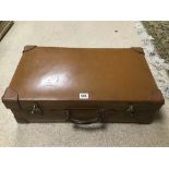 A VINTAGE LEATHER SUITCASE. BY W.W. BRIDGE, LTD LONDON.