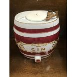 A PORCELAIN GIN BARREL 34CM HIGH