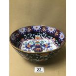 AN ORIENTAL CERAMIC BOWL OF CIRCULAR FORM, DECORATED THROUGHOUT WITH POLY-CHROME ENAMELS,