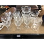 A QUANTITY OF CRYSTAL DRINKING GLASSES AND SUNDAE DISHES