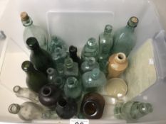 A QUANTITY OF EARLY BOTTLES, SOME OF WHICH ARE ADVERTISING BOTTLES