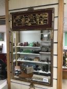 AN ORIENTAL BEVELLED EDGED MIRROR IN A BAMBOO STYLE FRAME 39 X 62 CM