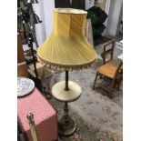 A VINTAGE BRASS AND ONXY STANDARD LAMP