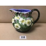 A WELSH CERAMIC POURING JUG BY JONATHAN COX CERAMICS, TITLED "SPRINGTIME" SIGNED TO BASE, 22CM LONG