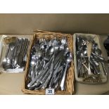 A LARGE QUANTITY OF MOSTLY STAINLESS STEEL AND SOME PLATED FLATEWARE, KNIVES FORKS ETC
