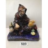 A ROYAL DOULTON FIGURE (THE POTTER)