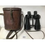 A PAIR OF WWII MILITARY BINOCULARS 'BINO PRISM NO 5, MARK 5, X 7' BROAD ARROW MARK AND DATED 1944,