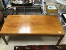 A MID-CENTURY TEAK COFFEE TABLE BY NATHAN