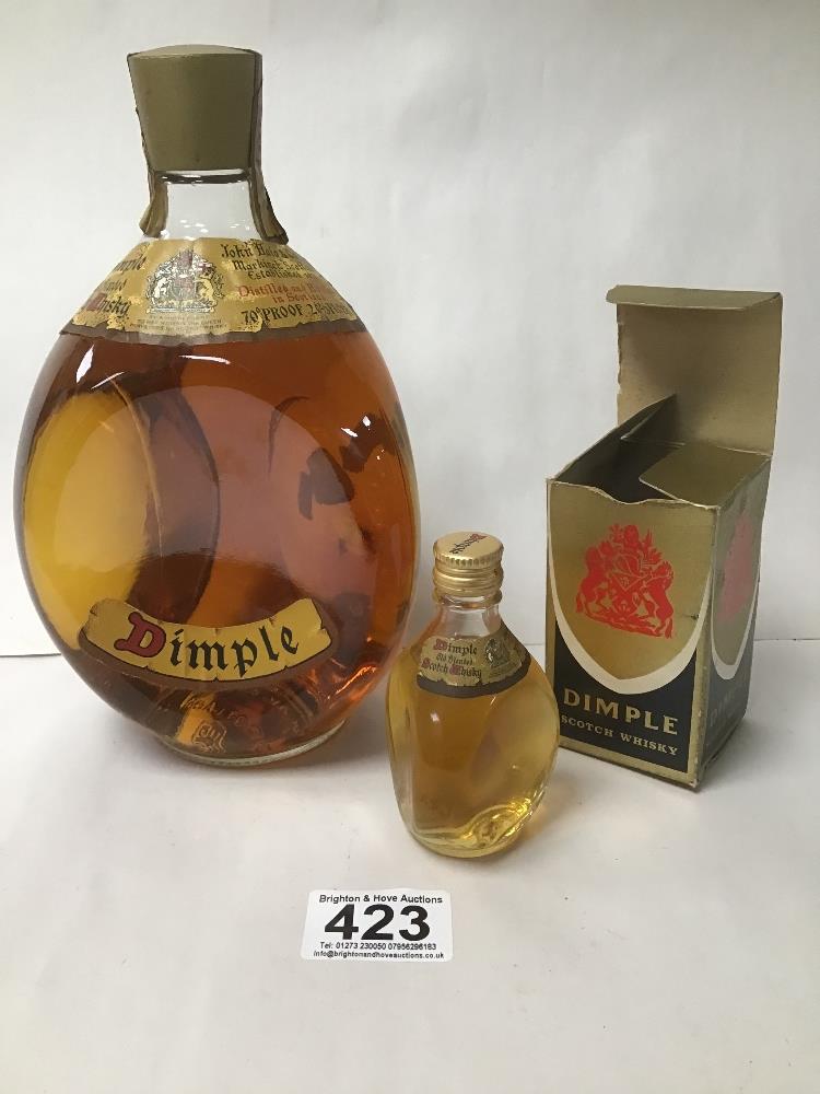 A RARE BLENDED WHISKEY DIMPLE 70% PROOF SEALED WITH A BOXED MINIATURE.