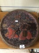 AN EARLY TERRACOTTA AND LACQUERED TERRACOTTA ORIENTAL PLATE/PLAQUE A/F 40 CM DIAMETER