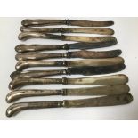 TEN SILVER HANDLE BUTTER KNIVES