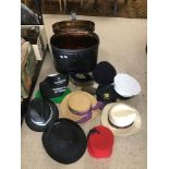 A LARGE METAL HAT BOX BY W M GEOCH OF GLASGOW WITH VINTAGE HATS