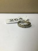 A 9CT GOLD LADIES ETERNITY RING WITH WHITE STONES SET STYLISED HEART SHAPES, 2.7G