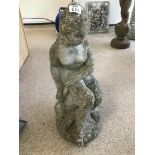 A CONCRETE GARDEN STATUE OF A SEATED LADY 59CMS