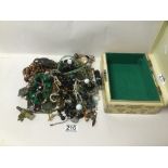 A MIXED BOX OF COSTUME JEWELLERY