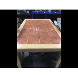 A MODERN TILED TOP KITCHEN TABLE 119 X 73 X 74CMS