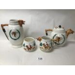 A FOUR PIECE CERAMIC TEA SET DEPICTING HUNTING SCENES, MARKED TO BASE PPC ENGLAND, COMPRISING TEA