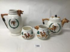 A FOUR PIECE CERAMIC TEA SET DEPICTING HUNTING SCENES, MARKED TO BASE PPC ENGLAND, COMPRISING TEA