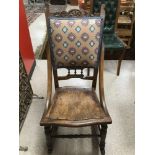 A VICTORIAN ROCKING CHAIR