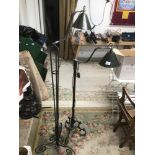 TWO WROUGHT IRON INDUSTRIAL LOOK FLOOR LAMPS