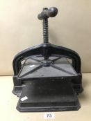 A VINTAGE CAST IRON BOOK PRESS