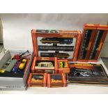 AN ASSORTMENT OF HORNBY RAILWAYS RELATED ITEMS, INCLUDING HST TRAIN PACK, CARRIAGES, WAGONS AND MUCH