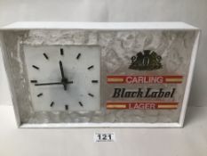 A VINTAGE CARLING BLACK LABEL LAGER WALL MOUNTED CLOCK
